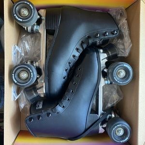 SOLD Black Impala Quad Roller Skates